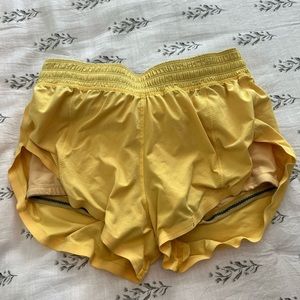 Yellow lululemon track that high rise shorts